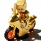 Close-up of gold plated pixel character riding the bike